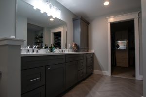 View of Master Bathroom vanity looking towards closet