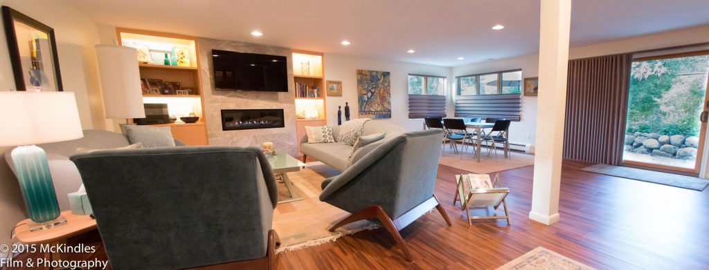 Panorama view of mid-century modern lower level living area